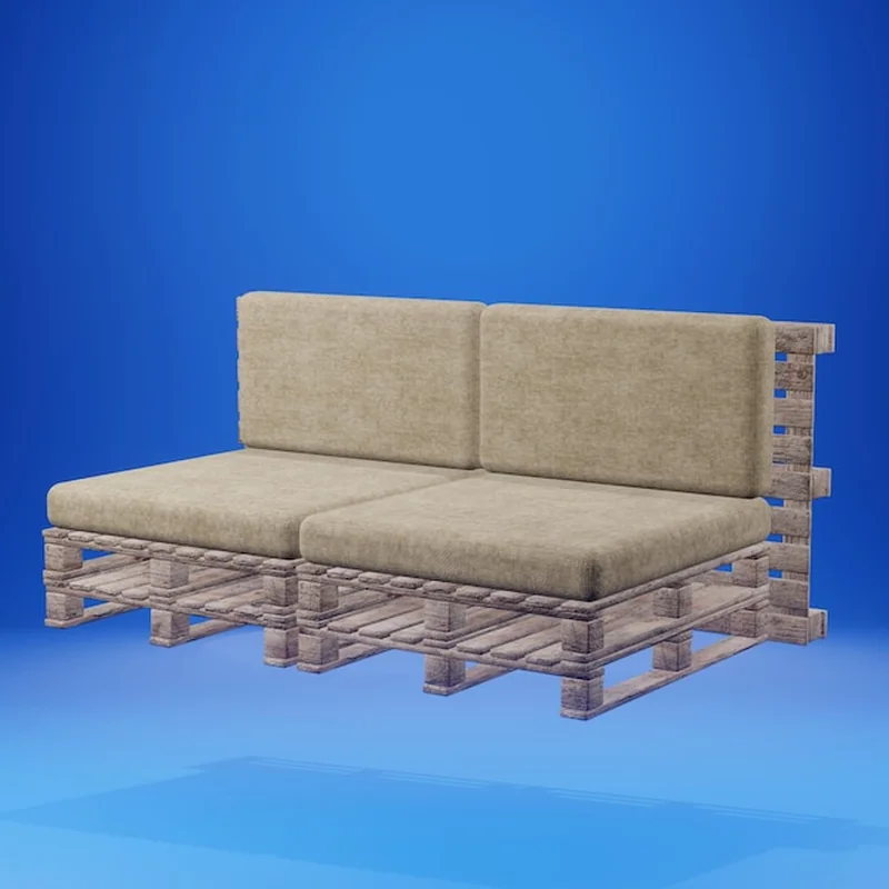Sofa z drewnianych palet i poduszkami na niebieskim tle