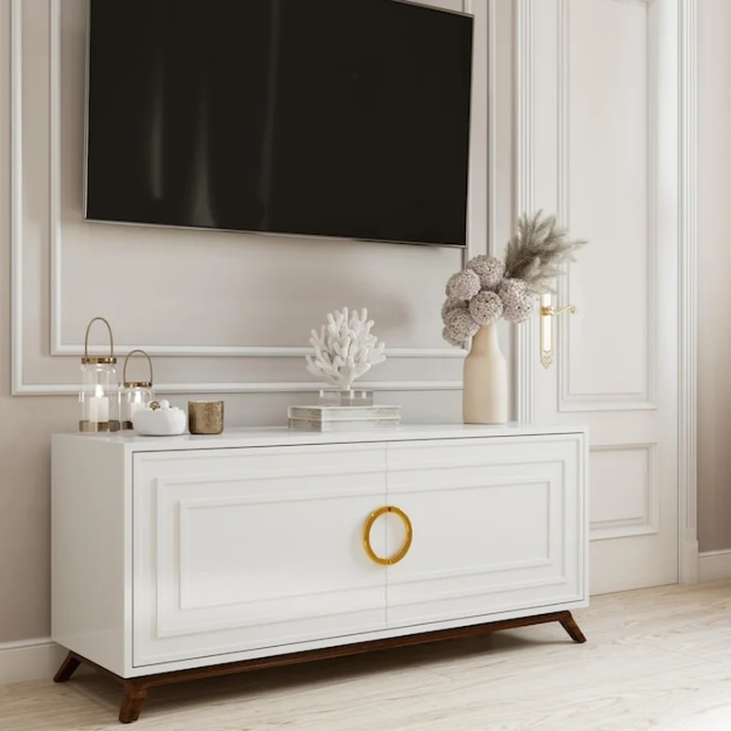 Biała szafka pod telewizorem w nowoczesnym salonie